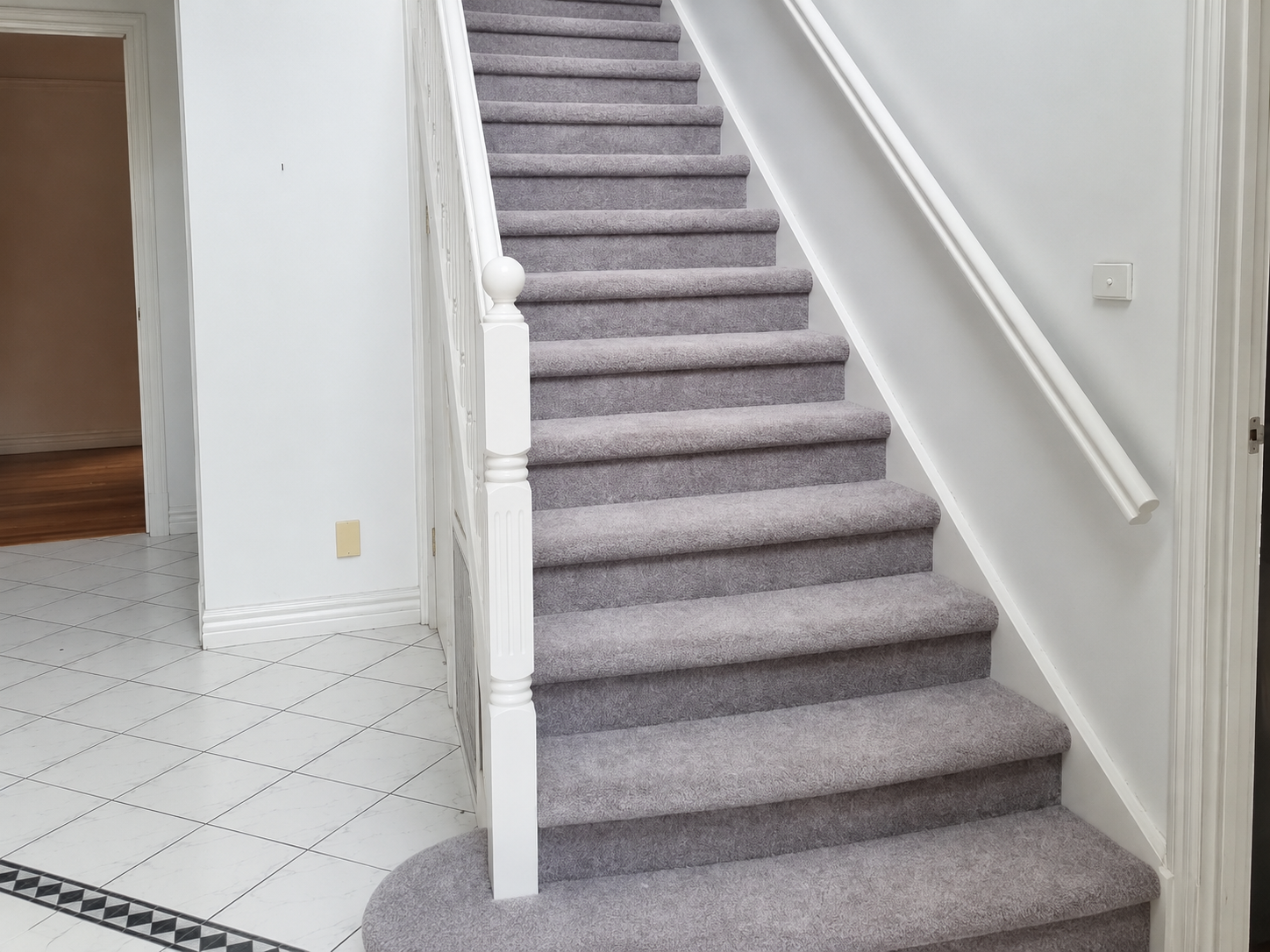 After: Bare boards to fully carpeted stairs