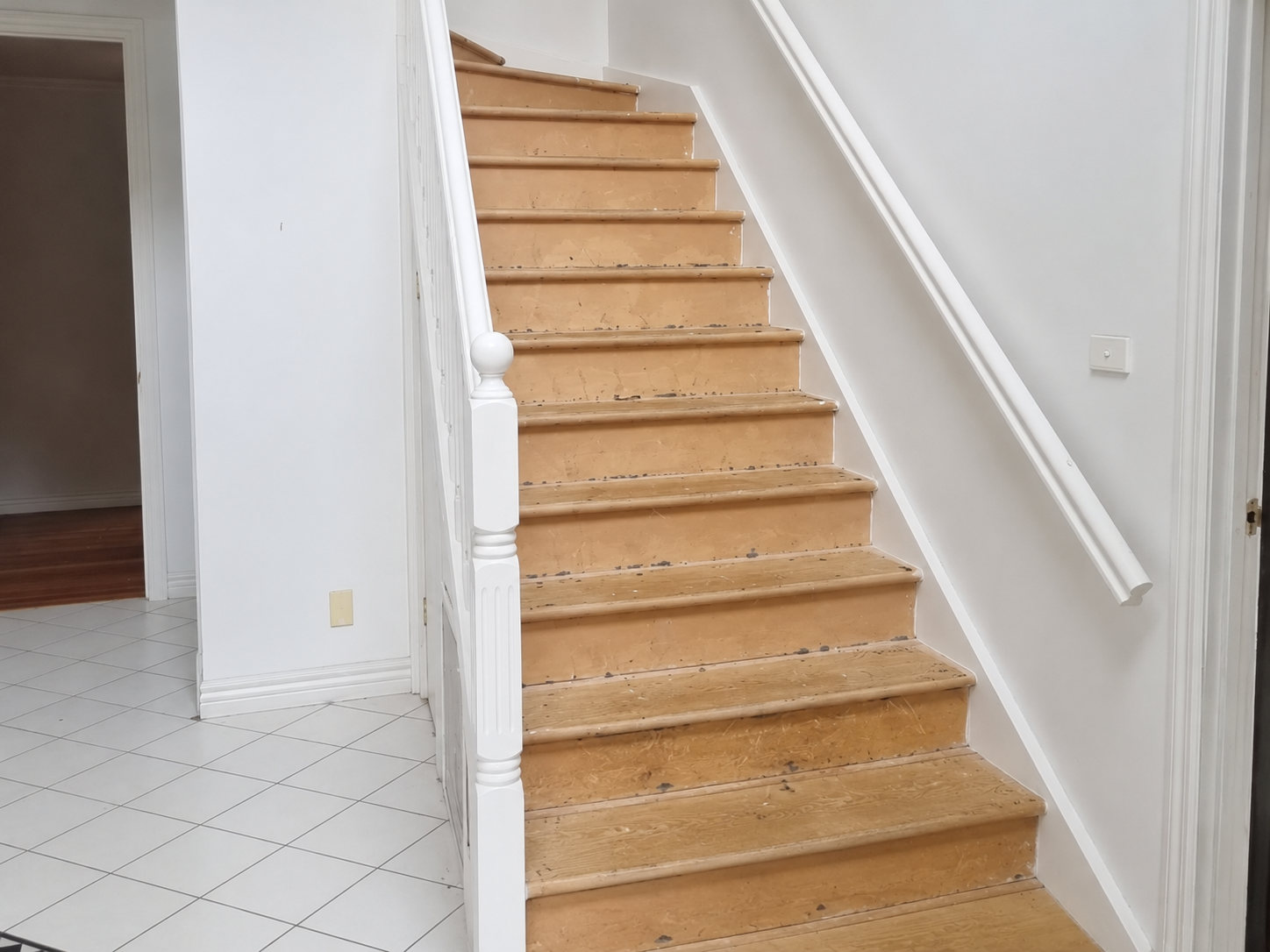 Before: Bare boards to fully carpeted stairs